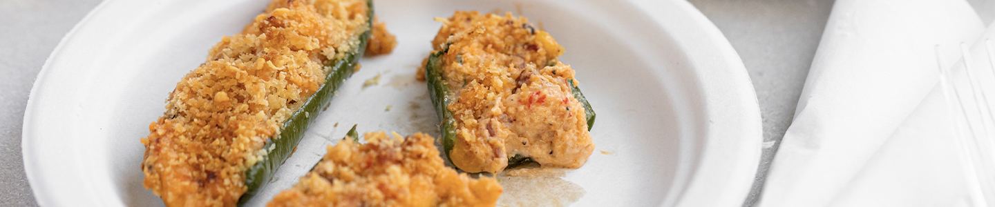 Crawfish-stuffed jalapeno peppers served on a Chinet Classic plate
